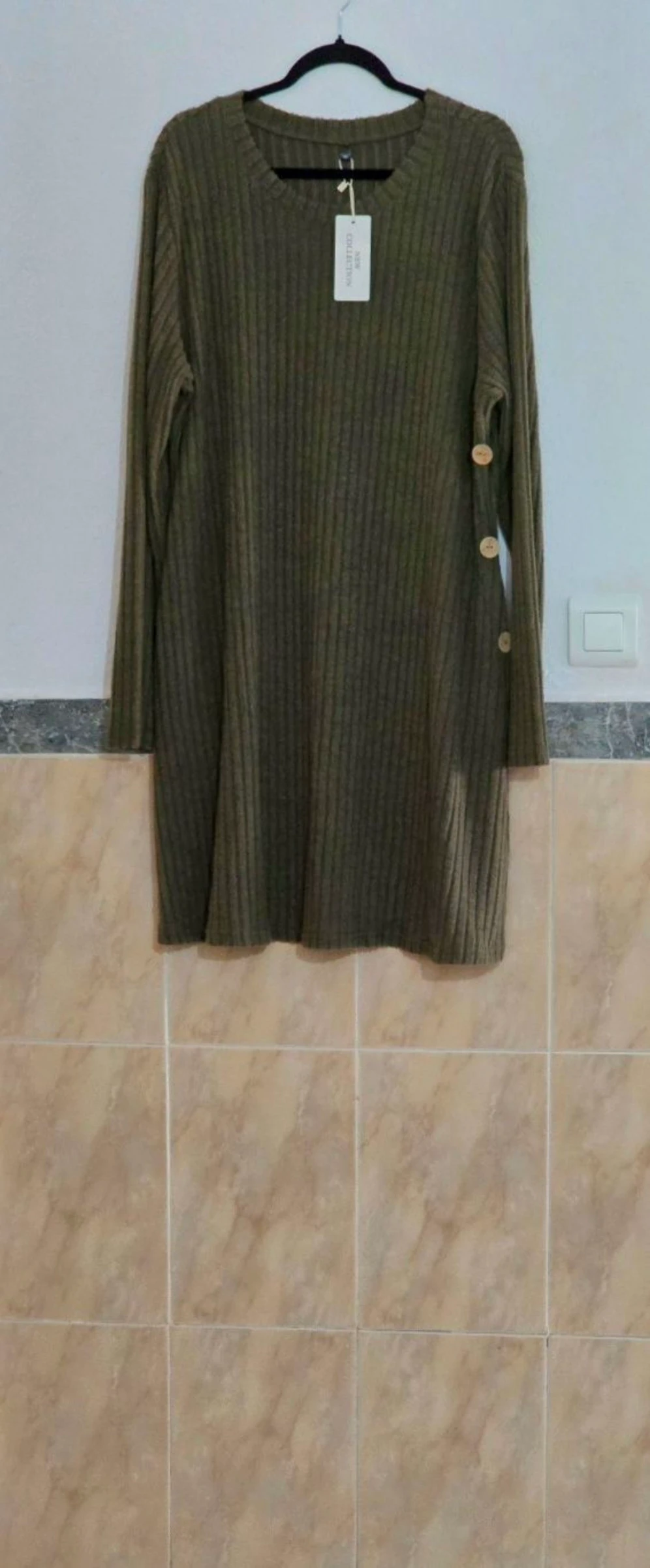 Vestido verde oscuro con bolsillos